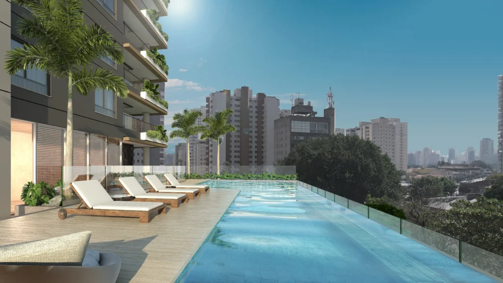 Piscina com espreguiçadeiras no lazer do Lumine, com vista para os prédios de São Paulo